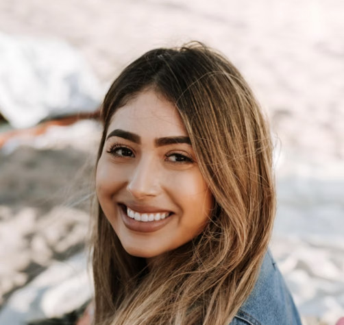 Smiling woman with long brown hair